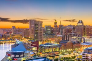 Baltimore city skyline at sunset near Harbor Park Garage.